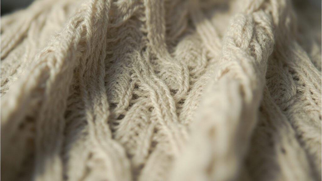 Tissu de cachemire tricoté, mailles en V nettes.